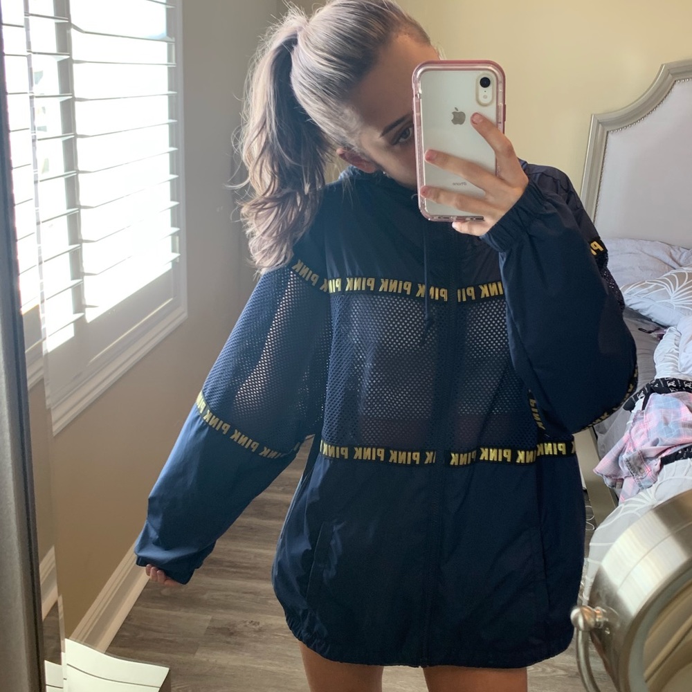 navy blue pink windbreaker